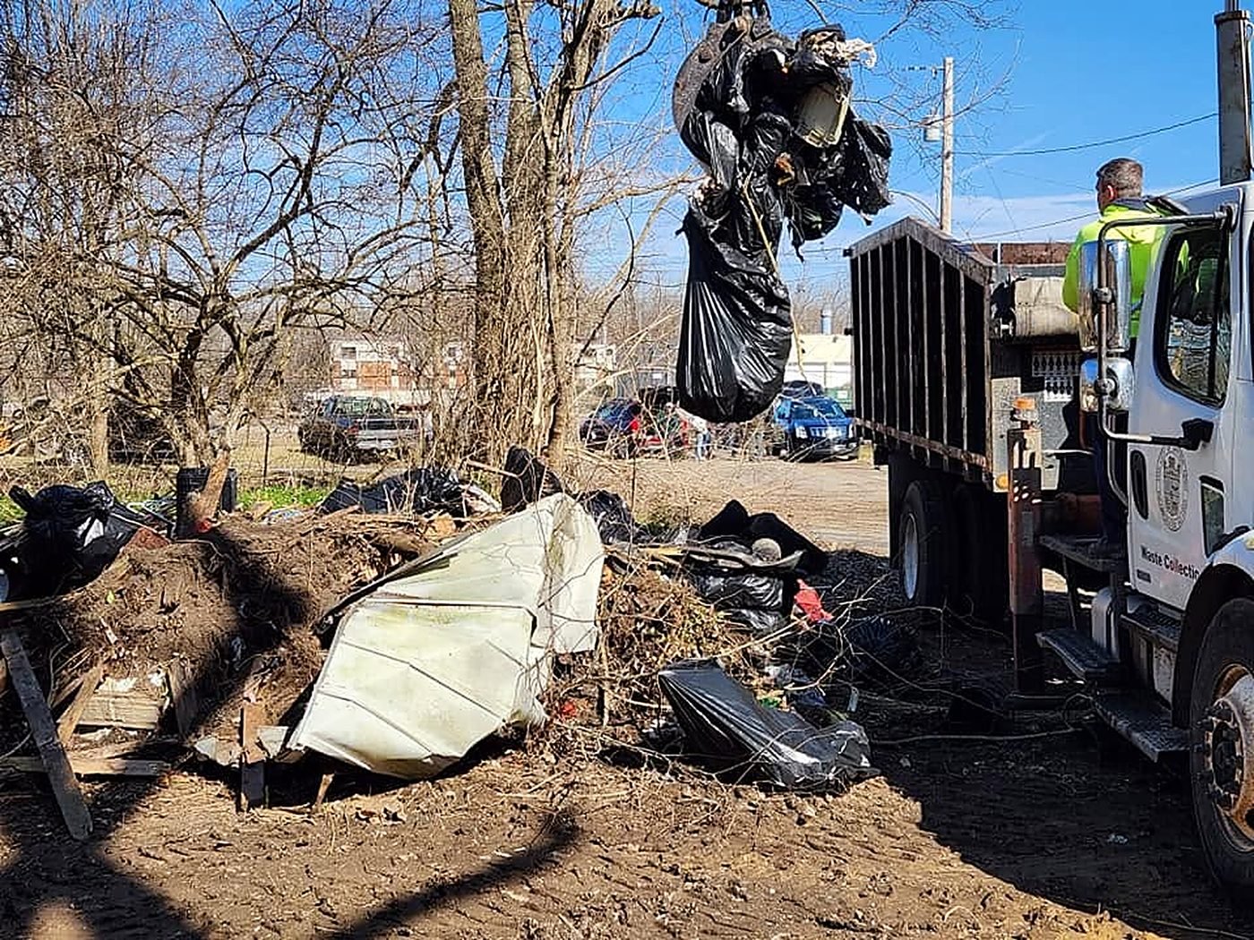 Heavy equipment clears bulk debris